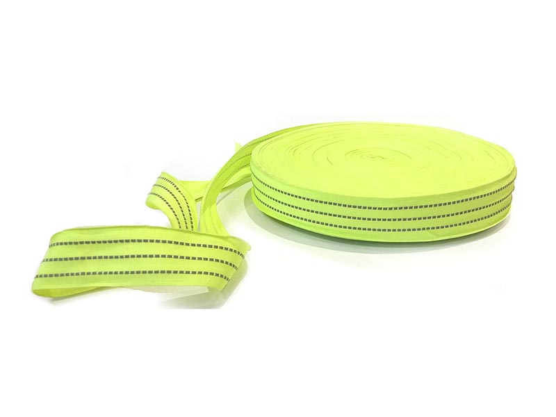 Cinta reflectiva p/coser de tela 4 cm x 100 mts Amarilla/Plata
